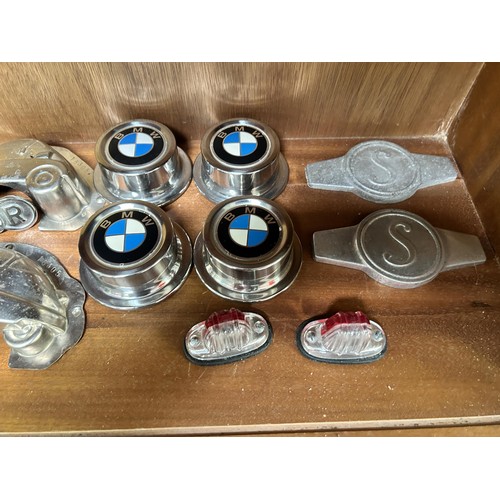 76 - Four BMW caps, an FMR badge, and other items
Being sold without reserve