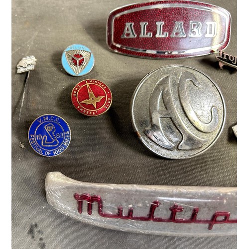 83 - An Allard car badge, a Multipla badge, and an AC badge, and assorted small pins/badges
Being sold wi...