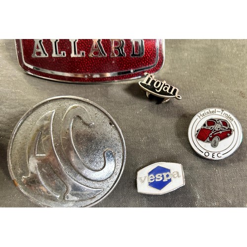 83 - An Allard car badge, a Multipla badge, and an AC badge, and assorted small pins/badges
Being sold wi...