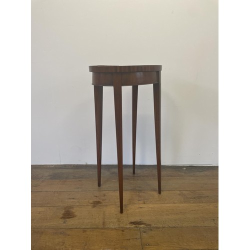 583 - A mahogany kettle stand, 73 cm high