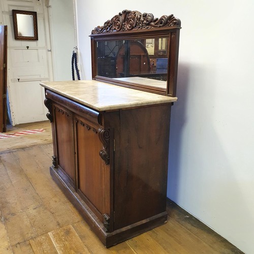 571 - A 19th century rosewood chiffonier, with a mirrored back and a marble top, above a base with a drawe... 