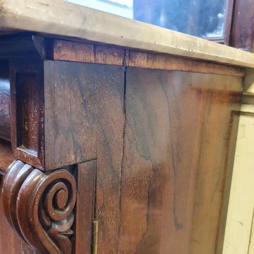 571 - A 19th century rosewood chiffonier, with a mirrored back and a marble top, above a base with a drawe... 