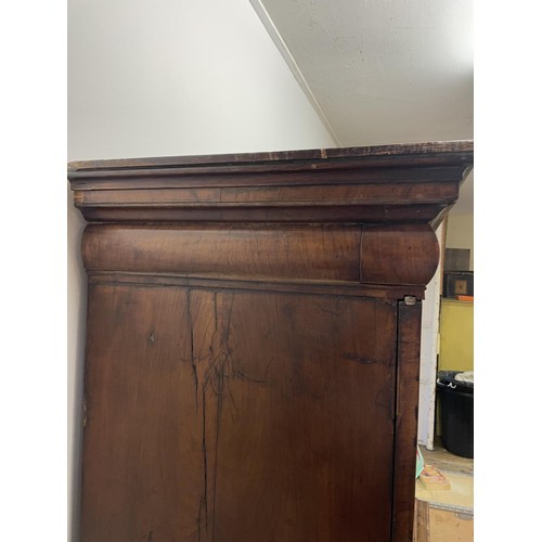 481 - An 18th century walnut cabinet on chest, with two cupboard doors, to reveal an interior with drawers... 