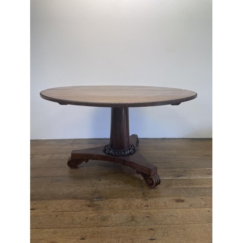 504 - A 19th century mahogany breakfast table, 137 cm wide