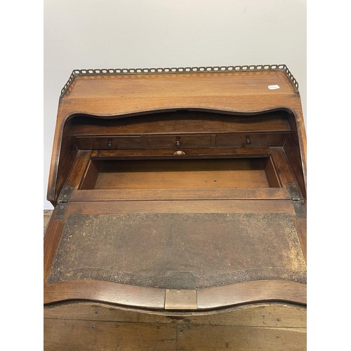 592 - A French rosewood ladies writing bureau, inlaid with flowers, on cabriole legs with gilt metal mount... 