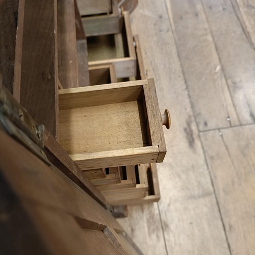 540 - A pine collectors cabinet, with two cupboard doors, to reveal a fitted interior, 53 cm wide