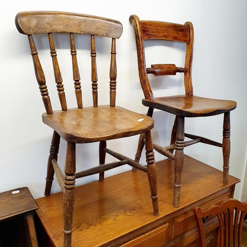 596 - An early 20th century mahogany revolving bookcase, 88 cm high, a pine kitchen table, 125 cm wide, an... 