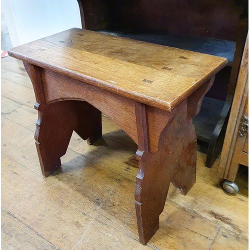 596 - An early 20th century mahogany revolving bookcase, 88 cm high, a pine kitchen table, 125 cm wide, an... 