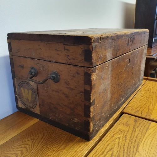 603 - A mid 20th century oak folding desk, with two drawers revealing various compartments, 84 cm wide, a ... 