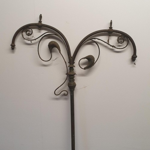 612 - A set of four wrought iron wall hooks, 60 cm wide and a part of a gas standard lamp 170 cm high (5)