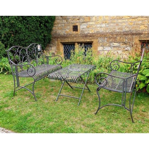 616 - A modern metal pair of garden benches, 110 cm wide, and a matching table 110 x 58 cm (3)