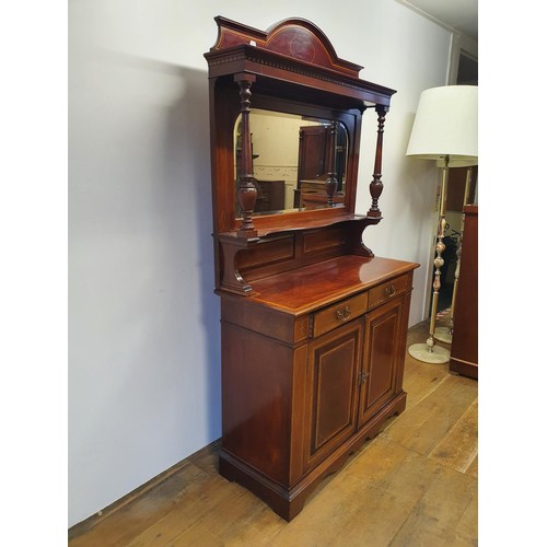 566 - A mahogany sideboard, with a mirrored back, 107 cm wide