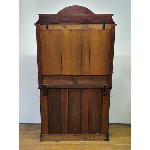 566 - A mahogany sideboard, with a mirrored back, 107 cm wide