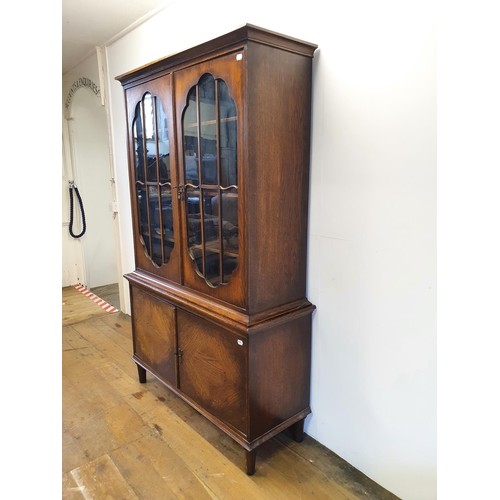 552 - A 19th century mahogany bow front chest, having two long and three short drawers, 105 cm wide, and a... 