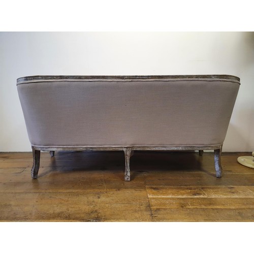 532 - A modern grey sofa, with a limed oak frame, 170 cm wide