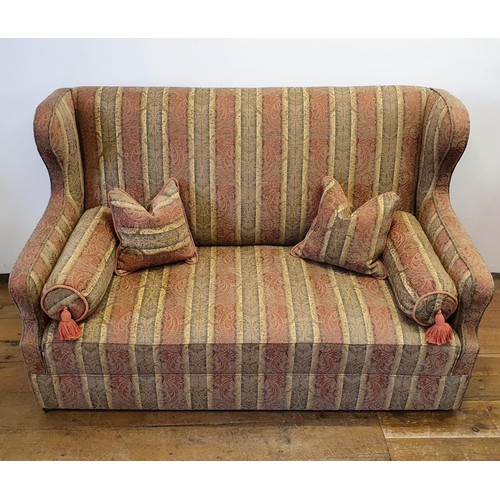 538 - A wing back sofa, 159 cm wide