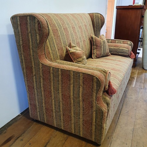 538 - A wing back sofa, 159 cm wide