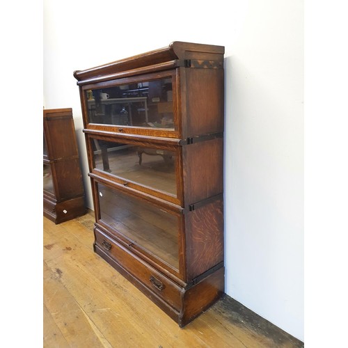 499 - A Globe Wernicke oak three section bookcase