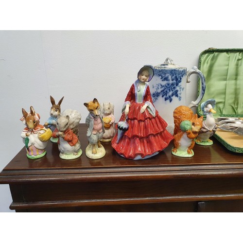 343 - A mahogany display cabinet and assorted ceramics (qty)