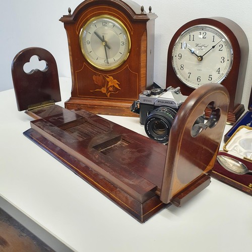 295 - A silver cigarette case, a set of silver spoons, a book slide, two clocks and other items (box)