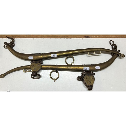 246 - A pair of brass hames, 83 cm wide