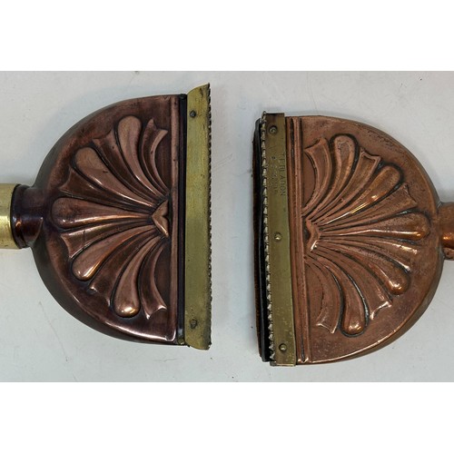 248 - A pair of 19th century brass and copper horse combs, 36 cm (2)