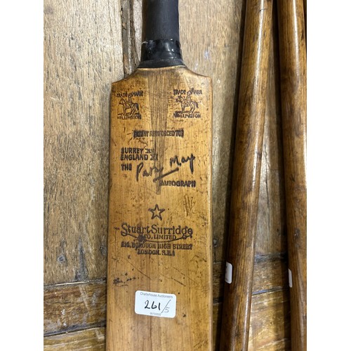 261 - A Stuart Sturridge cricket bat, another and three cricket stumps (5)