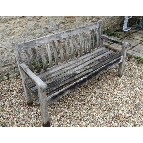 620 - A teak garden bench, 153 cm wide