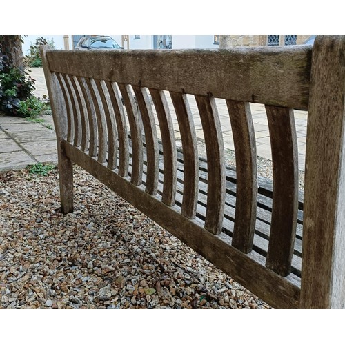 620 - A teak garden bench, 153 cm wide