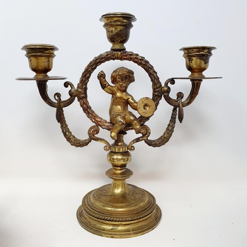 329 - A pair of bronze vases, 13 cm high, a pair of candlesticks, and a two branch candelabrum (5)