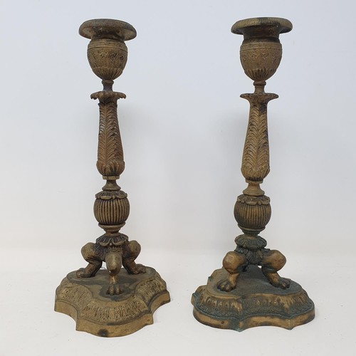 329 - A pair of bronze vases, 13 cm high, a pair of candlesticks, and a two branch candelabrum (5)