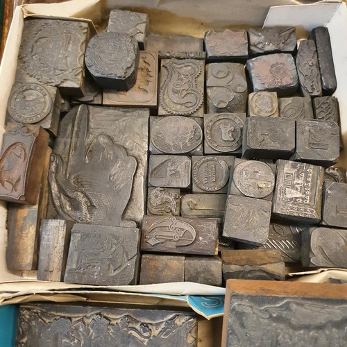 331 - A miniature cast iron garden urn, a carved Chinese box, various printing blocks, and assorted items ... 