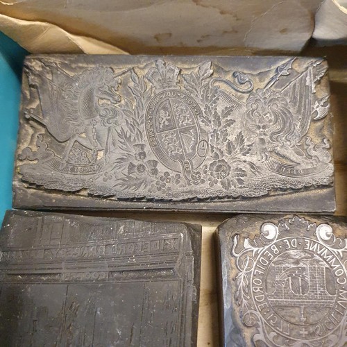 331 - A miniature cast iron garden urn, a carved Chinese box, various printing blocks, and assorted items ... 