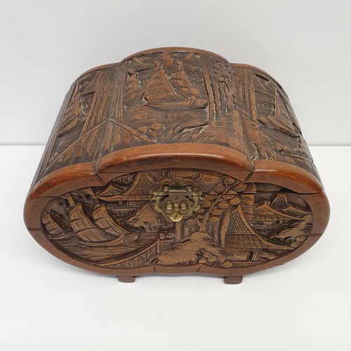 364 - A carved camphorwood box, 33 cm wide