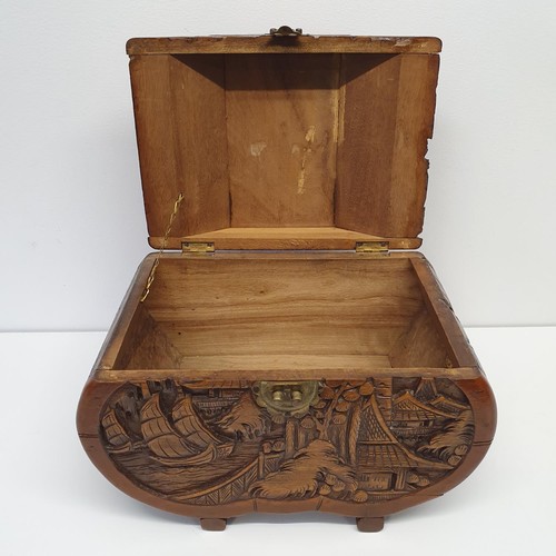 364 - A carved camphorwood box, 33 cm wide