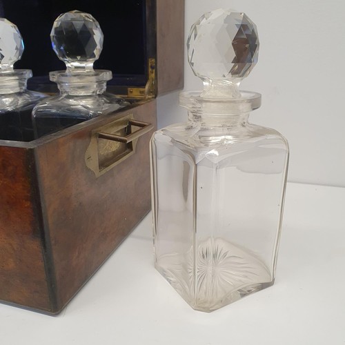 386 - A 19th century walnut decanter box, fitted with four decanters, 25 cm wide