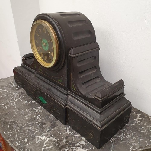 408 - A mantel clock, in a polished slate case, 50 cm wide