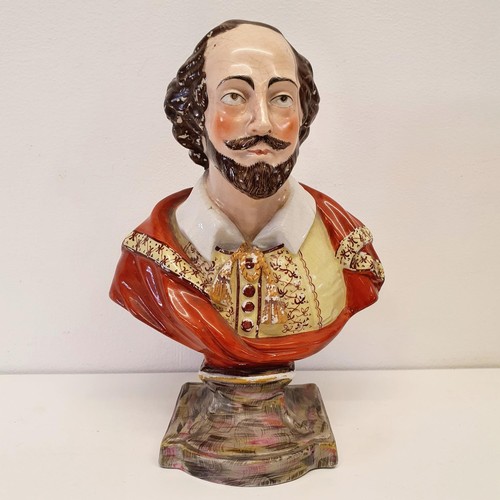 424 - A Victorian Staffordshire bust, Shakespeare, star crack to the back and with slight loss and general... 