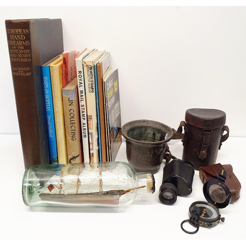 427 - A 17th century style bronze mortar, 9.5 cm high, a compass, a monocular, a ship in a bottle, a group... 