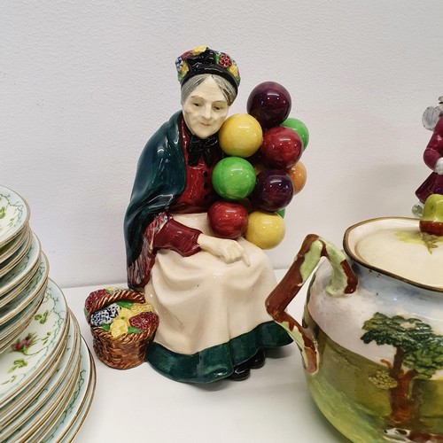 429 - A Royal Doulton figure, The Old Balloon Seller, HN1315, a Wedgwood comical elephant, and other assor... 