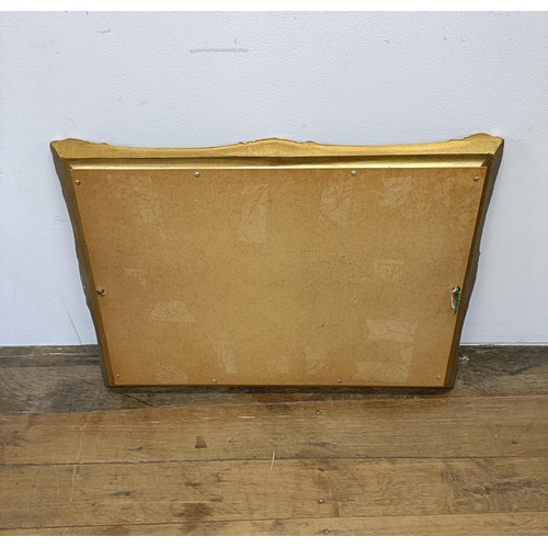 489 - A gilt framed wall mirror, 57 x 80 cm