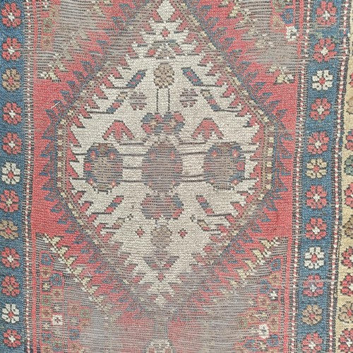 534 - A Persian red ground runner, 300 x 100 cm