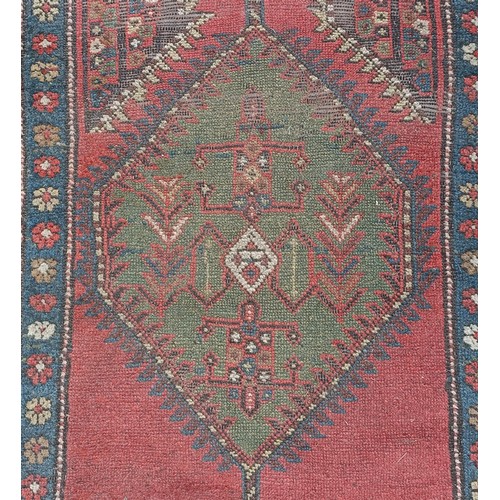 534 - A Persian red ground runner, 300 x 100 cm