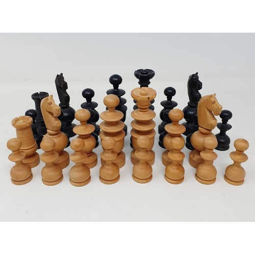 360 - A turned wood chess set, the king being 10 cm high, in a pine box, incomplete