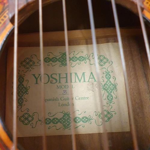 383 - An acoustic guitar, Yoshima, Model 3, with Spanish Guitar Centre London label, with carrying case