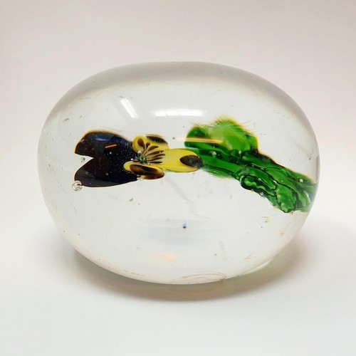 414 - A glass paperweight, decorated a Violet, possibly Baccarat, 6.5 cm diameter