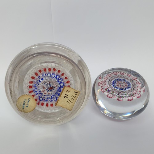 415 - A glass milleflori paperweight, 7 cm diameter, and a similar inkwell, cracked (2)