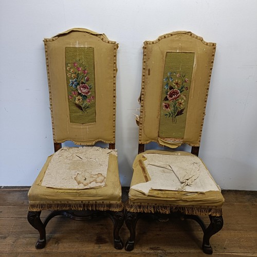 526 - A set of seven Carolean style dining chairs, with padded backs and seats, on carved cabriole legs, t... 