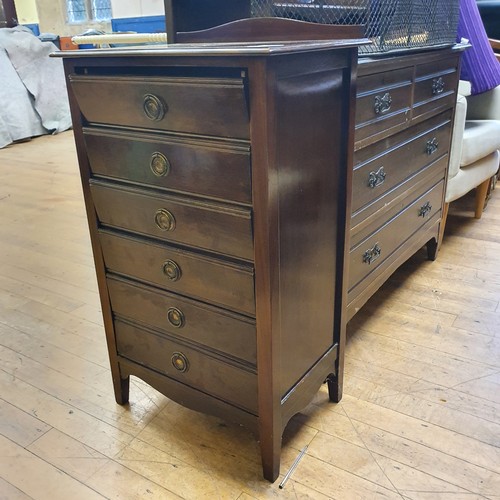 634 - A mahogany music cabinet, 53 cm wide, a walnut dressing chest, 107 cm wide, and a child's high chair... 