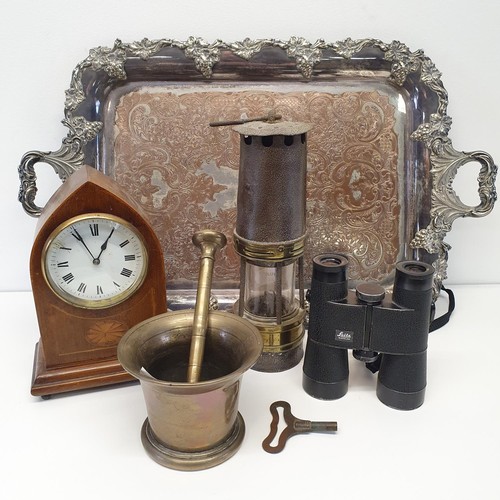 436 - A miners lamp, a mantle clock, in an inlaid lancet case, a pair of Leitz binoculars, a pestle and mo... 